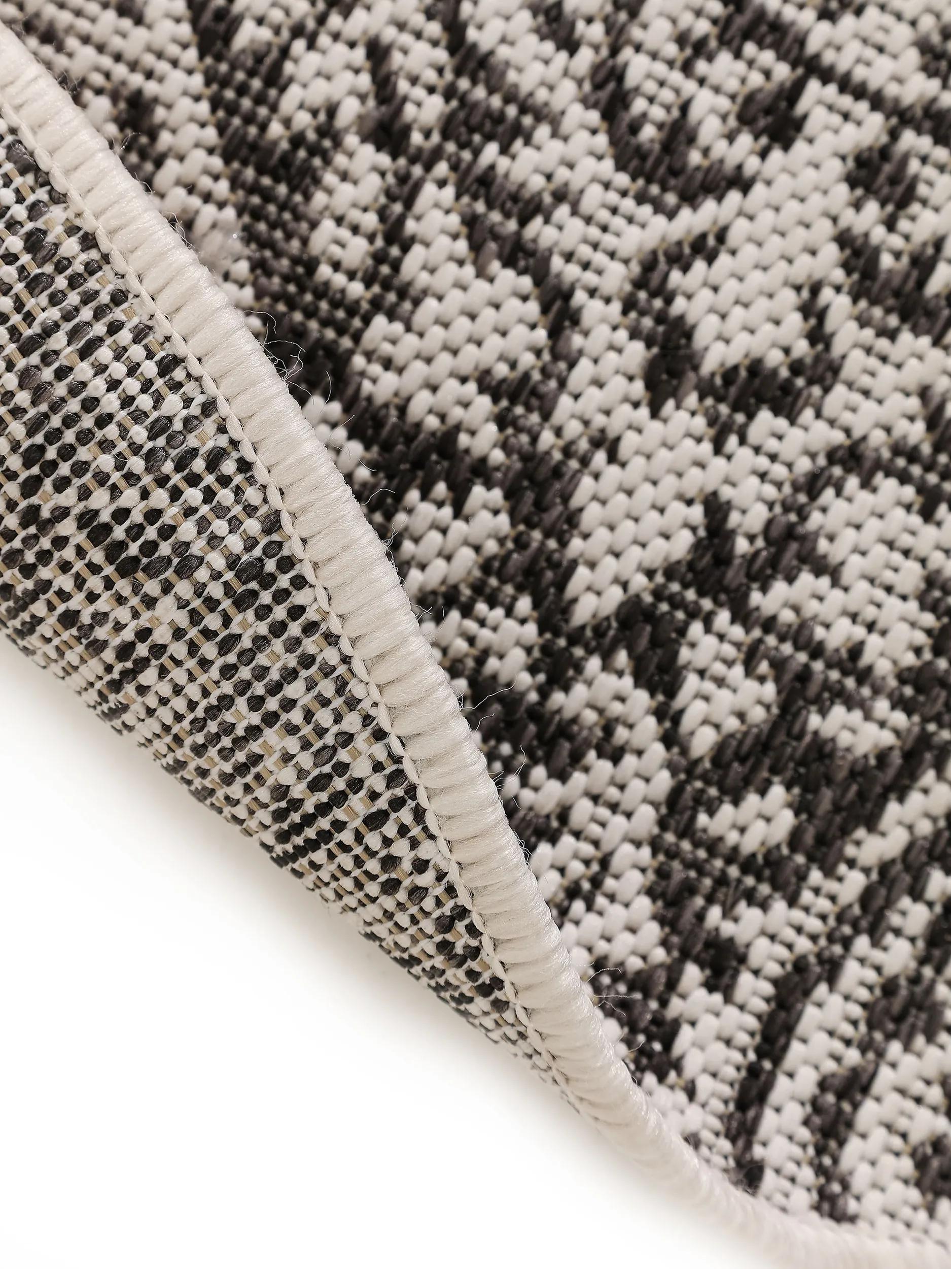 Tapis rond intérieur et extérieur Cleo blanc/noir