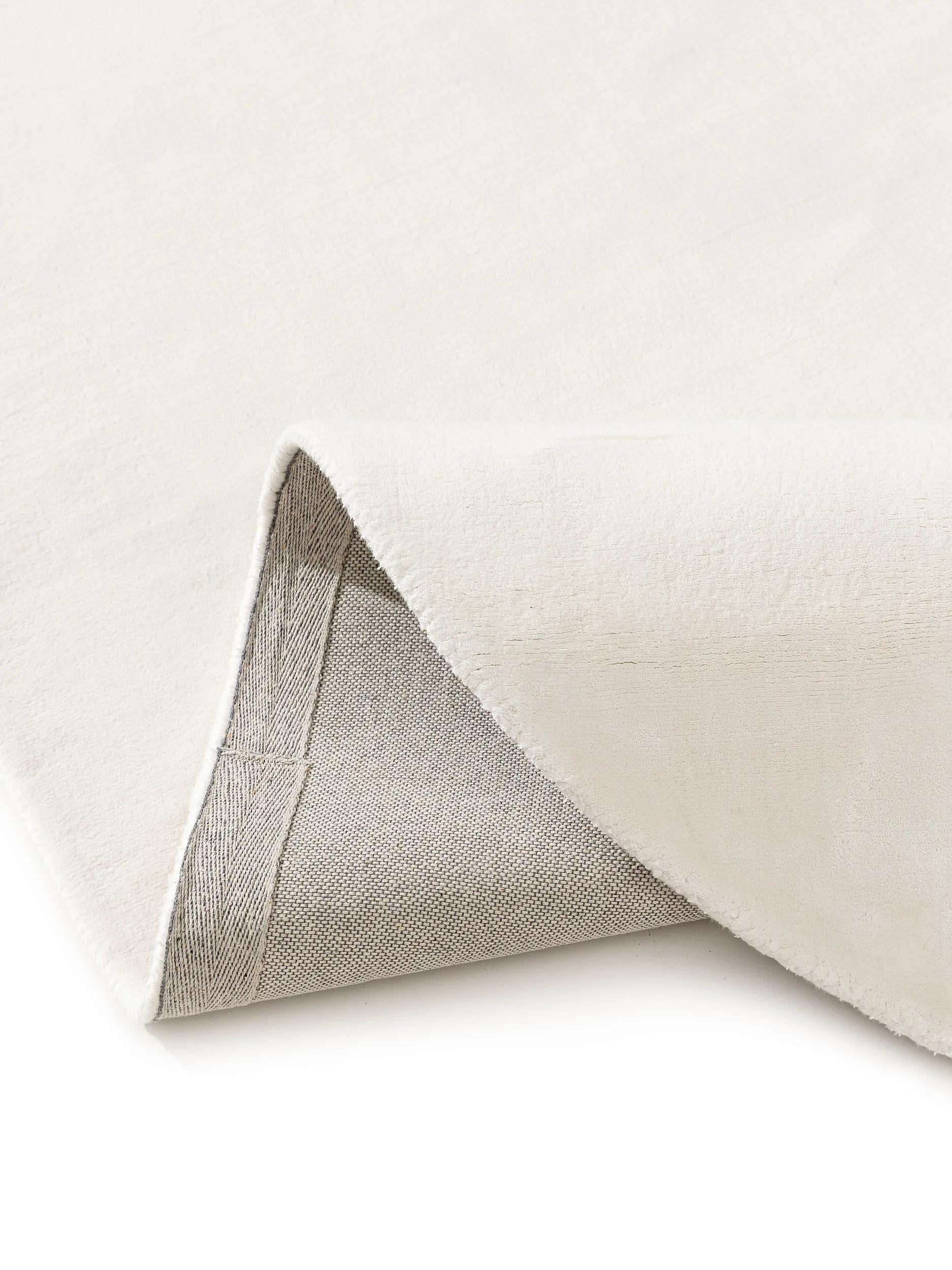 Tapis en viscose ovale Nela ivoire