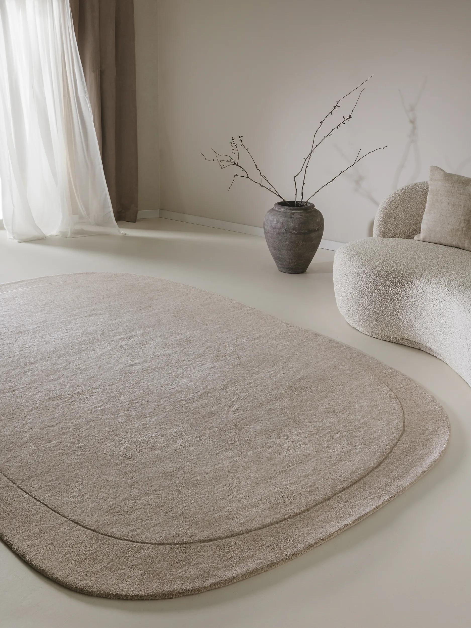 Alfombra de lana forma crema