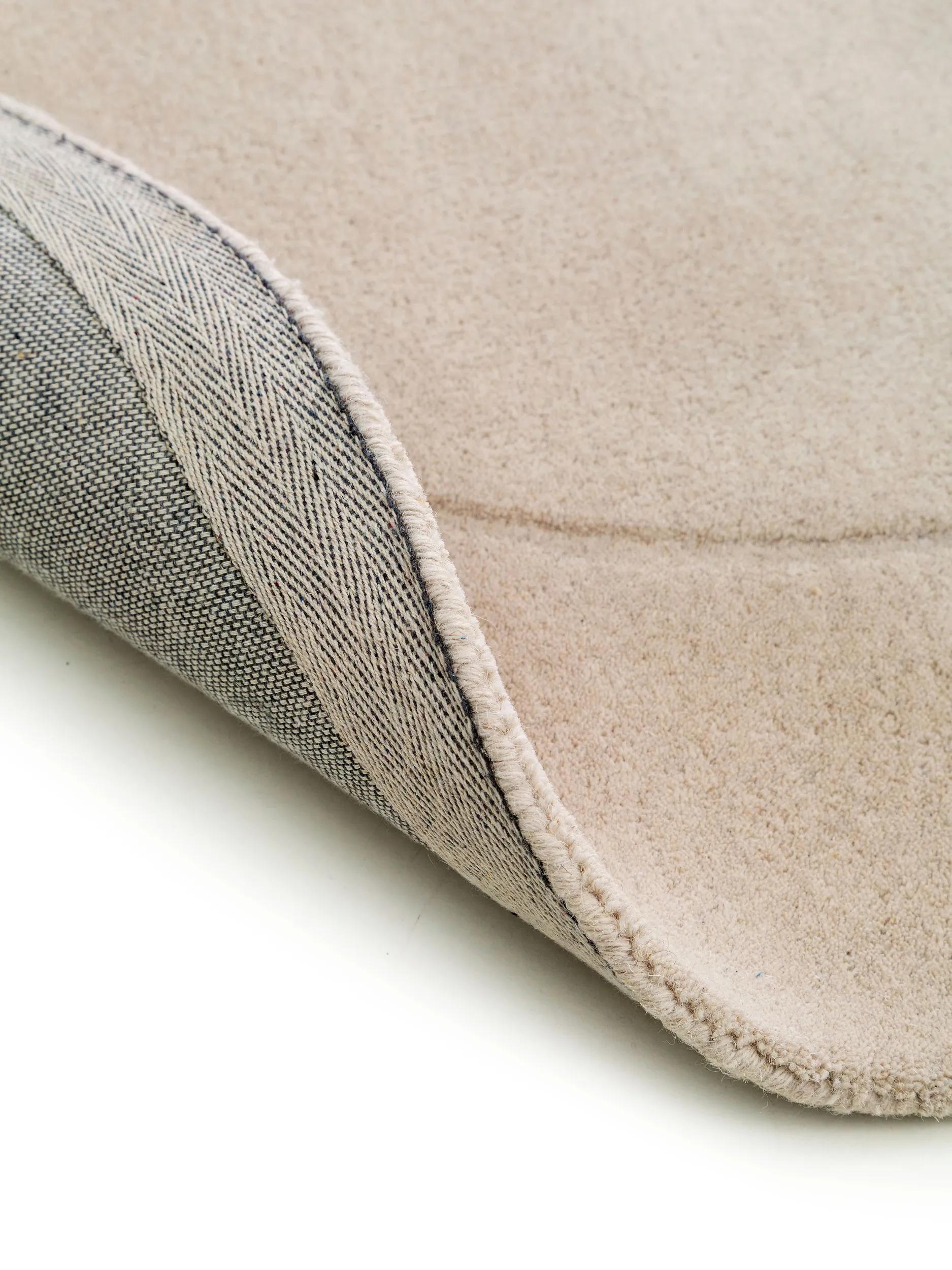 Alfombra de lana forma crema