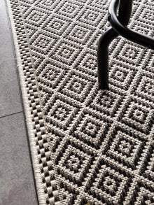 Corredor de interior y exterior Cleo blanco/negro