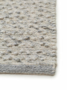 Alfombra de lana gris