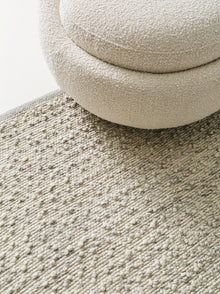 Alfombra de lana gris
