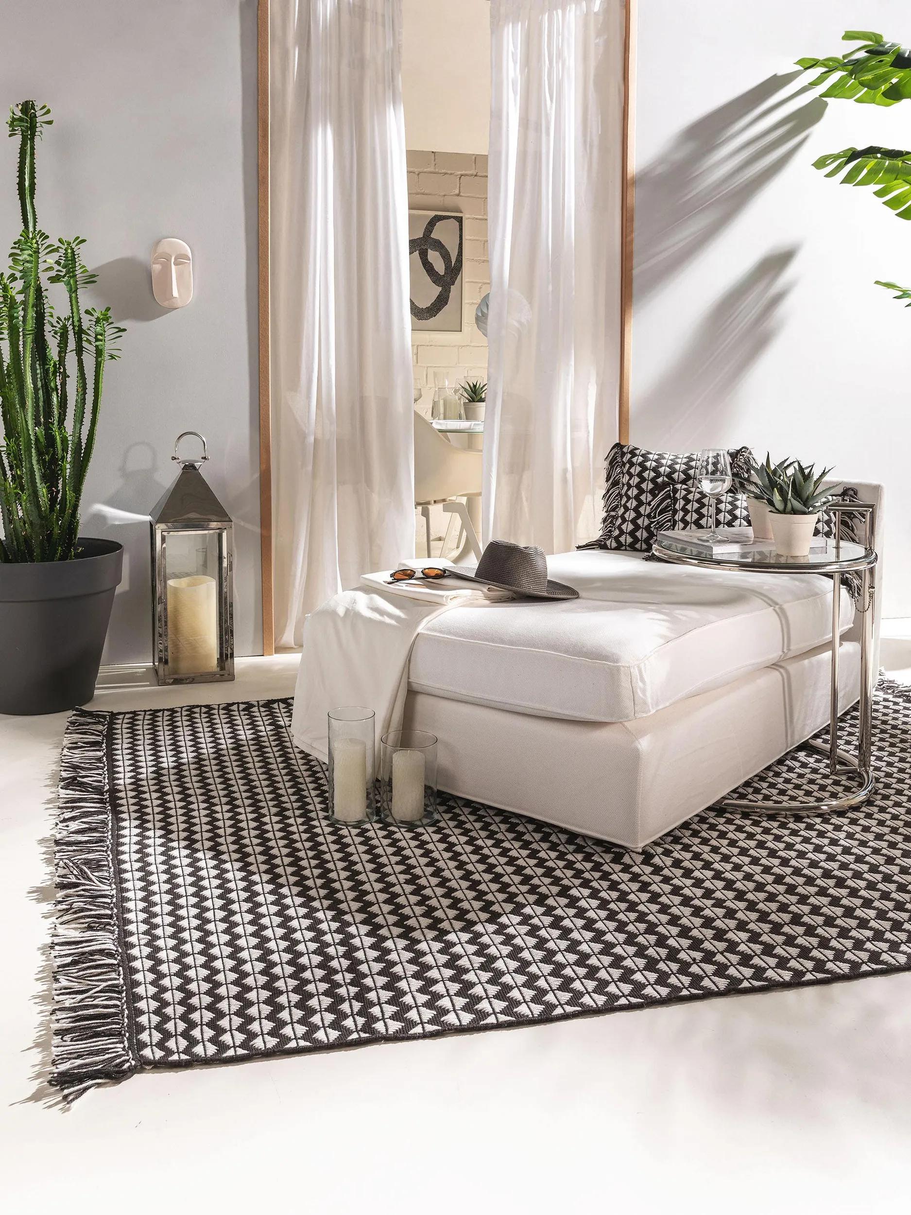 Tapis fabriqué à partir de matériau recyclé Morty Noir/Blanc