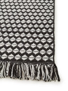 Tapis fabriqué à partir de matériau recyclé Morty Noir/Blanc