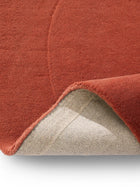 Tapis en laine forme rouge