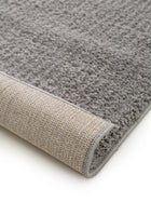 Alfombra peluda Soda Gris